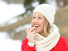 What are some ways to prevent dry and cracked lips during the winter, as recommended by experts?